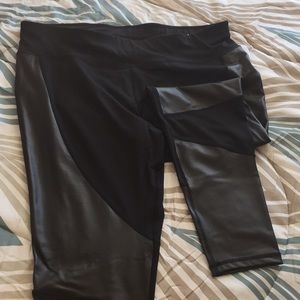 Black workout leggings with faux leather design